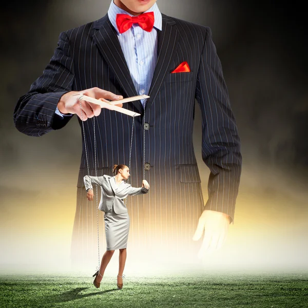 Businessman puppeteer — Stock Photo, Image