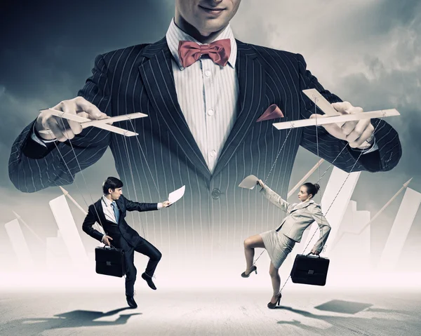 Businessman puppeteer — Stock Photo, Image