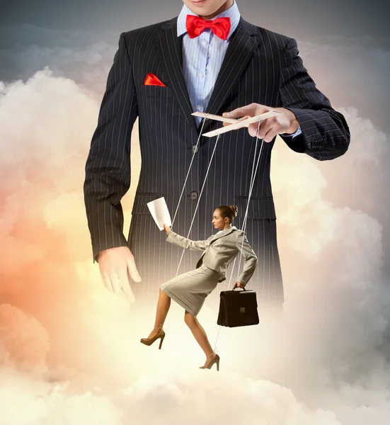 Businessman puppeteer — Stock Photo, Image