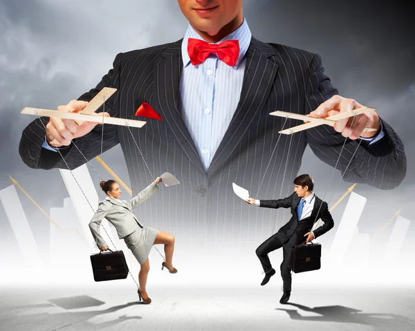 Businessman puppeteer — Stock Photo, Image