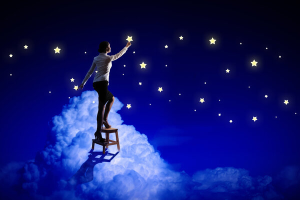 Mujer estrellas de iluminación — Foto de Stock