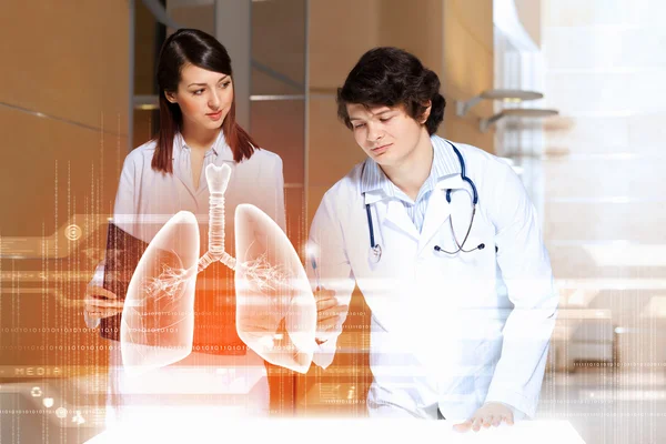 Two young doctors — Stock Photo, Image