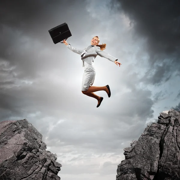 Young businesswoman jumping — Stock Photo, Image