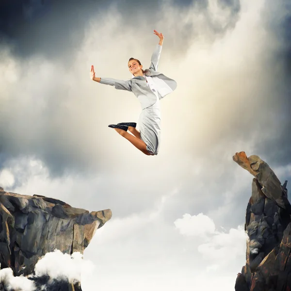 Young businesswoman jumping — Stock Photo, Image