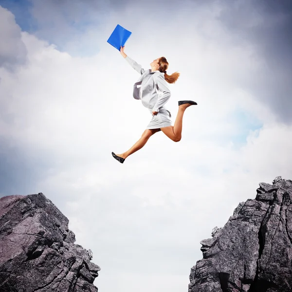 Young businesswoman jumping — Stock Photo, Image