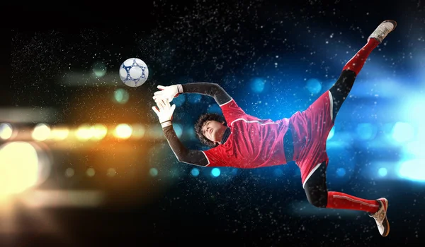 Goalkeeper catches the ball — Stock Photo, Image