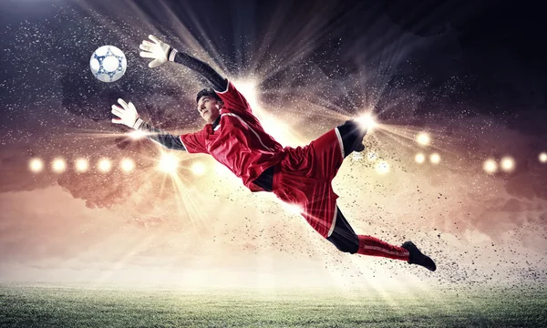 Goalkeeper catches the ball — Stock Photo, Image