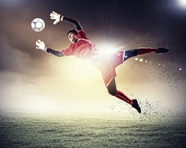 Goalkeeper catches the ball — Stock Photo, Image