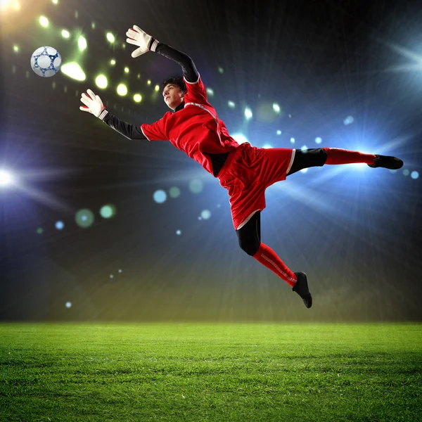 Goalkeeper catches the ball — Stock Photo, Image