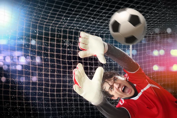 Goalkeeper catches the ball — Stock Photo, Image