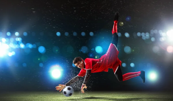 Goalkeeper catches the ball — Stock Photo, Image