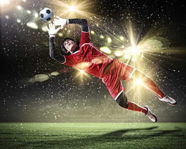 Goalkeeper catches the ball — Stock Photo, Image