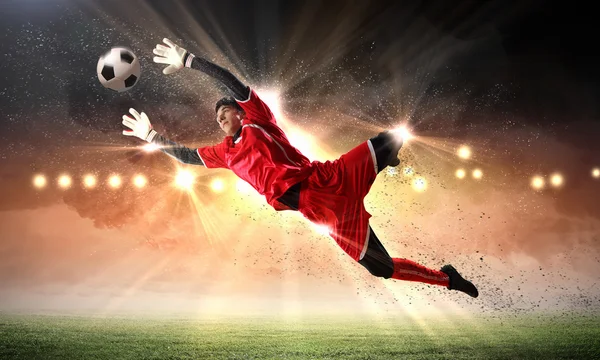 Goalkeeper catches the ball — Stock Photo, Image