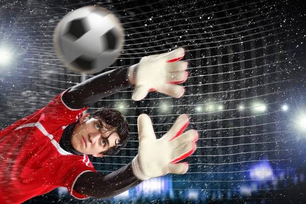 Goalkeeper catches the ball — Stock Photo, Image