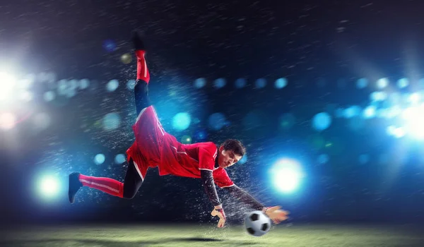 Goalkeeper catches the ball — Stock Photo, Image