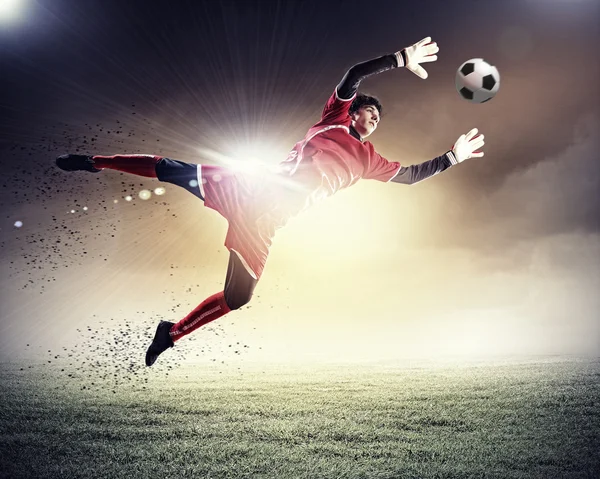 Goalkeeper catches the ball — Stock Photo, Image