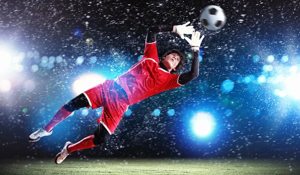 Goalkeeper catches the ball — Stock Photo, Image