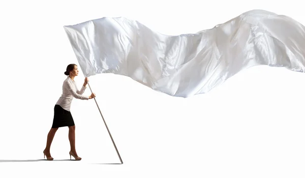 Businesswoman holding white flag — Stock Photo, Image