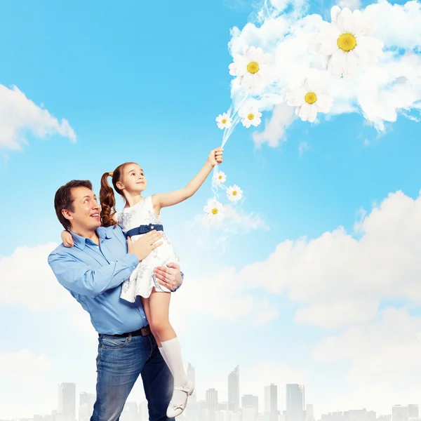 Father holding on hands daughter — Stock Photo, Image