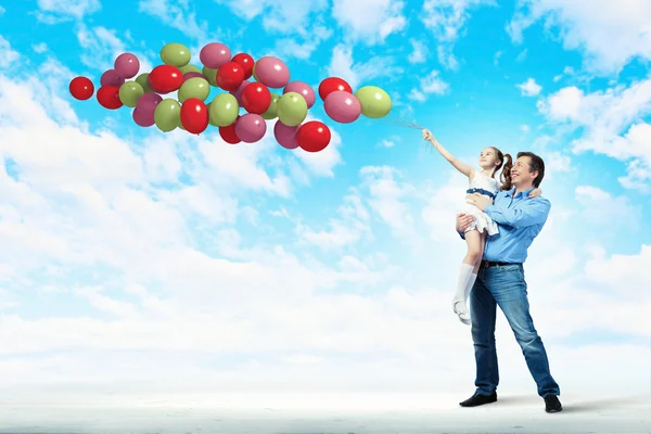Father holding on hands daughter — Stock Photo, Image