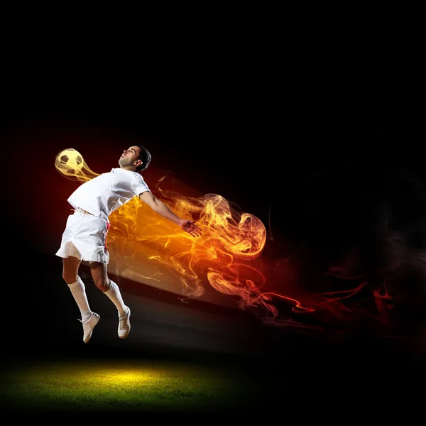 Football player with ball Stock Image