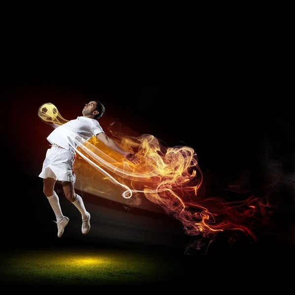 Football player with ball Royalty Free Stock Images