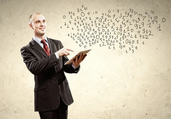 Businessman holding tablet pc — Stock Photo, Image