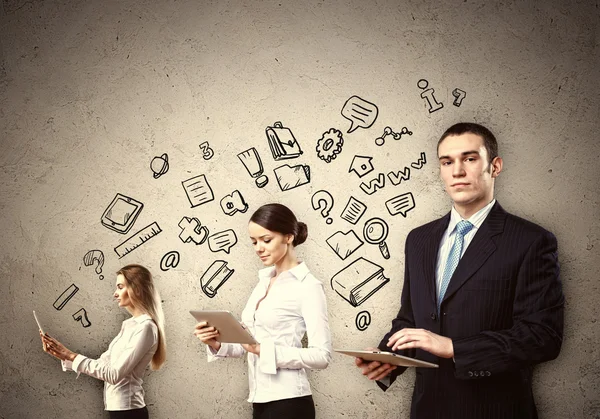 Three young in business suits — Stock Photo, Image