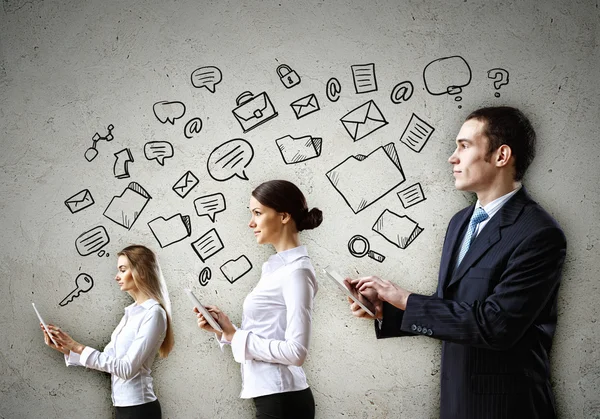 Three young in business suits — Stock Photo, Image