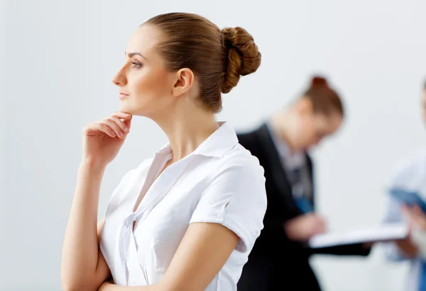 Attractive business woman thinking — Stock Photo, Image