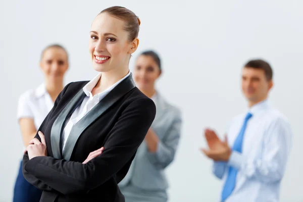 Four businesswomen standing in row — Stock Photo, Image