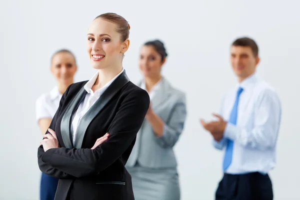 Four businesswomen standing in row — Stock Photo, Image