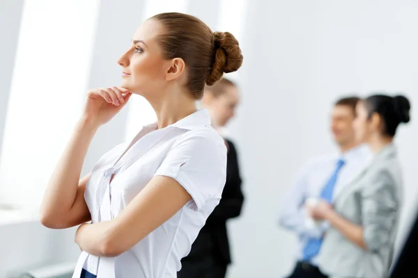 Four businesswomen standing in row — Stock Photo, Image