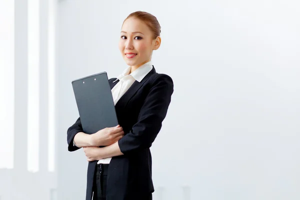 Attractive asian businesswoman in formal suit — Stock Photo, Image