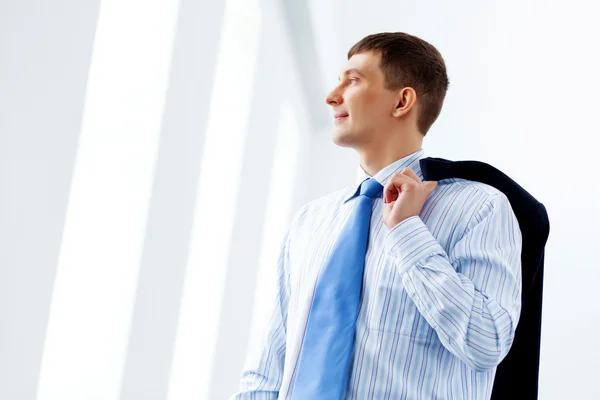 Hombre de negocios en traje sonriendo —  Fotos de Stock