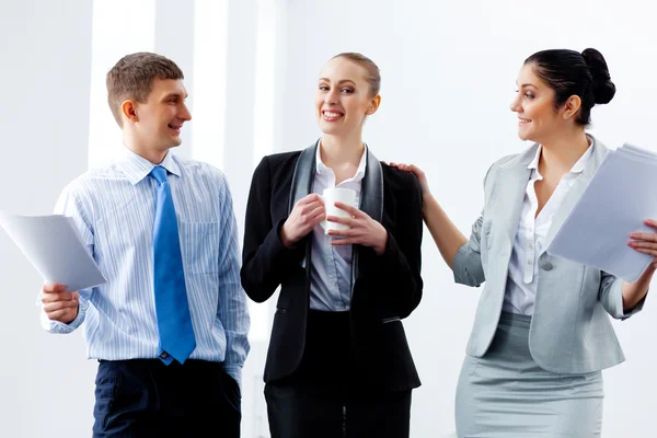 Three young business laughing Stock Photo