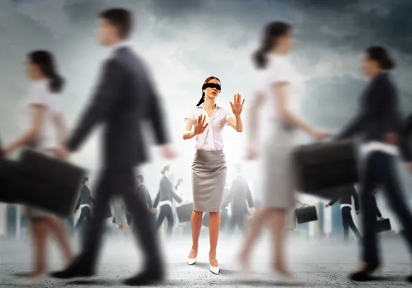 Businesswoman in blindfold among group of — Stock Photo, Image