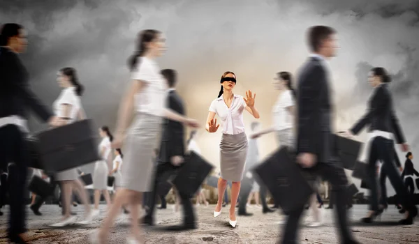 Businesswoman in blindfold among group of — Stock Photo, Image