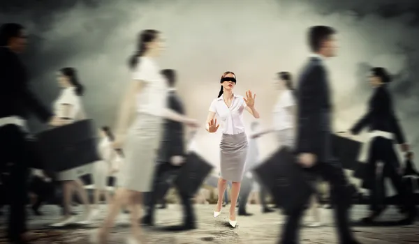 Businesswoman in blindfold among group of — Stock Photo, Image