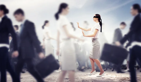 Businesswoman in blindfold among group of — Stock Photo, Image