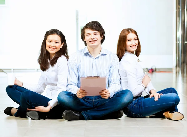Three students smiling — Stock Photo, Image