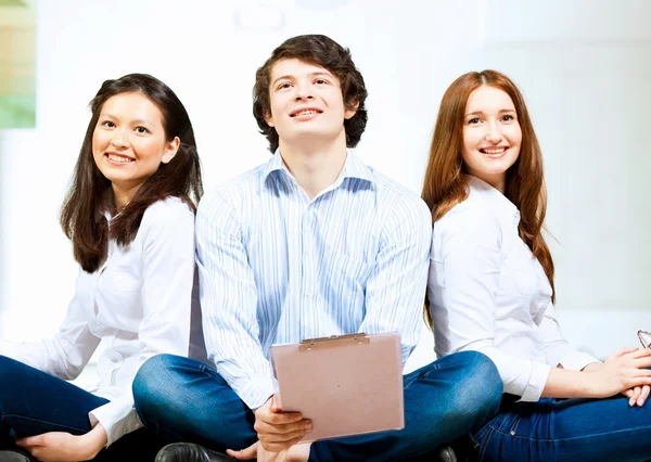Three students smiling — Stock Photo, Image