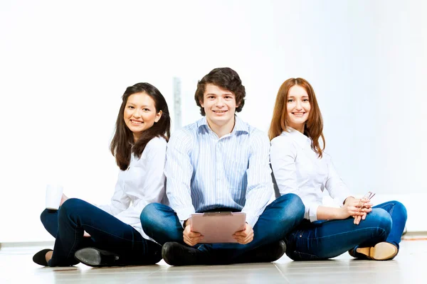 Three students smiling — Stockfoto