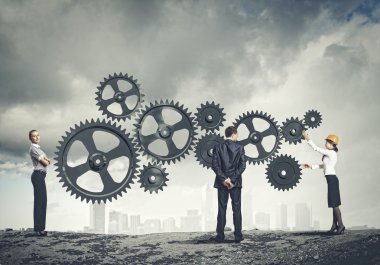 iş insanları ve mekanizma elemanları