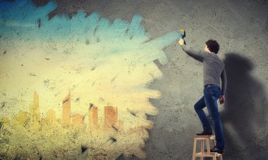 genç adam ve duvardaki cityscape