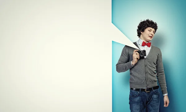 Young man with photo camera — Stock Photo, Image