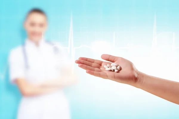 Human palm with pills — Stock Photo, Image