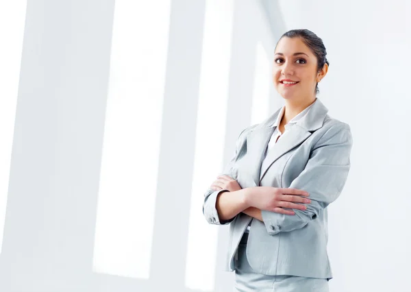 Attractive asian businesswoman in grey suit — Stock Photo, Image
