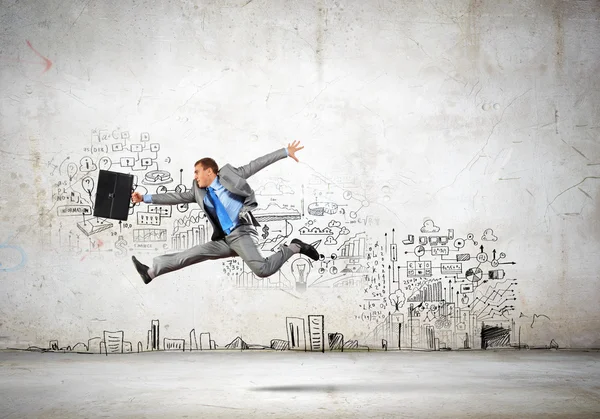 Jumping businessman — Stock Photo, Image