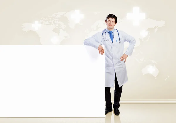 Male doctor with banner — Stock Photo, Image